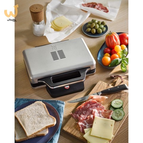 Opiekacz do kanapek WMF Lono 415150011 (800W; kolor srebrny) Opiekacz do kanapek WMF Lono 415150011 (800W; kolor srebrny)